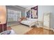 Light-filled bedroom with a comfortable bed, large window, and stylish decor provides a relaxing retreat at 312 Germander Ave, Summerville, SC 29483