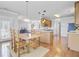 Dining area leads to kitchen with open view of the living room at 312 Germander Ave, Summerville, SC 29483