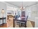 Dining area view into living room with beautiful floors and a cozy atmosphere at 312 Germander Ave, Summerville, SC 29483