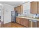 Well-lit kitchen features stainless steel appliances and ample cabinet space at 312 Germander Ave, Summerville, SC 29483