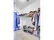 Organized walk-in closet with shelves for shoes and hanging clothes offering lots of storage space at 312 Germander Ave, Summerville, SC 29483