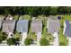 Aerial view of homes with well-kept lawns and orderly driveways at 3198 Conservancy Ln, Charleston, SC 29414