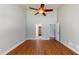 Spacious bedroom with hardwood floors, tall ceilings, and neutral paint at 3198 Conservancy Ln, Charleston, SC 29414