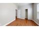 Neutral bedroom with hardwood floors, closet, and doorway at 3198 Conservancy Ln, Charleston, SC 29414