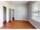 Spacious bedroom with hardwood floors, window and closet at 3198 Conservancy Ln, Charleston, SC 29414