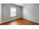 Bedroom featuring wood floors and a window with natural light at 3198 Conservancy Ln, Charleston, SC 29414
