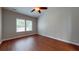 Bedroom featuring wood floors and a ceiling fan for added comfort at 3198 Conservancy Ln, Charleston, SC 29414