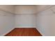 Walk-in closet with shelving and hardwood floors for organization at 3198 Conservancy Ln, Charleston, SC 29414