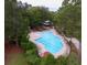Inviting community pool area with lounge chairs and lush landscaping at 3198 Conservancy Ln, Charleston, SC 29414