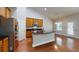 Open-concept kitchen with stainless steel appliances and a granite island at 3198 Conservancy Ln, Charleston, SC 29414