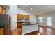 Bright kitchen features stainless steel appliances, a gas range and a large island with a breakfast bar at 3198 Conservancy Ln, Charleston, SC 29414