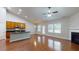 Open-concept living room features hardwood floors, a fireplace, and lots of natural light at 3198 Conservancy Ln, Charleston, SC 29414