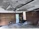 This is a look at the garage featuring wood paneling and an automatic garage door at 321 Fairington Dr, Summerville, SC 29485