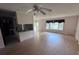 View of the expansive living area with a partial kitchen and wood floors at 321 Fairington Dr, Summerville, SC 29485