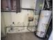Water heater and wall damage shown in utility room at 321 Fairington Dr, Summerville, SC 29485
