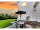 Backyard view with patio, table, and lush landscaping at 3224 Hatchway Dr, Mount Pleasant, SC 29466