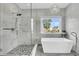 Stunning bathroom with soaking tub and a luxurious glass enclosed shower at 3224 Hatchway Dr, Mount Pleasant, SC 29466