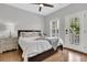 Inviting bedroom with lots of natural light and a dark wooden bedframe at 3224 Hatchway Dr, Mount Pleasant, SC 29466