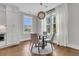 Bright dining area with hardwood floors, pendant lighting, and views of the outdoors at 3224 Hatchway Dr, Mount Pleasant, SC 29466