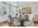 Bright dining room with natural light, comfortable seating, and elegant decor at 3224 Hatchway Dr, Mount Pleasant, SC 29466