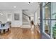 Inviting entryway with hardwood floors, staircase, and seamless flow to other living spaces at 3224 Hatchway Dr, Mount Pleasant, SC 29466