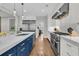 Bright kitchen with a large island, stainless steel appliances, and seamless flow to the dining area at 3224 Hatchway Dr, Mount Pleasant, SC 29466