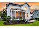 A well-maintained home features a screened-in porch and a landscaped yard at 3224 Hatchway Dr, Mount Pleasant, SC 29466