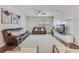 Comfortable living room featuring stylish furniture, an entertainment center, ceiling fan, and large area rug at 339 Iveson Rd, Summerville, SC 29486