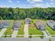 Aerial view of well-maintained homes, lawns, and gardens creating a tranquil and inviting neighborhood environment at 352 Matuskovic Dr, Charleston, SC 29414
