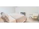 Comfortable bedroom with a bed, chair, and bedside table, offering a relaxing and inviting space for rest at 352 Matuskovic Dr, Charleston, SC 29414