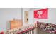 A well-decorated bedroom shows off a laundry area through an open door at 352 Matuskovic Dr, Charleston, SC 29414