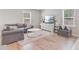 Comfortable living room with plush seating, a modern entertainment center, and natural light at 352 Matuskovic Dr, Charleston, SC 29414