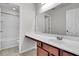Bright bathroom with a bathtub and a large mirror above the vanity at 354 Beachgrass Ln, Summerville, SC 29486