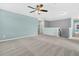 Spacious bonus room featuring neutral colored walls, plush carpeting, and a modern ceiling fan with light at 354 Beachgrass Ln, Summerville, SC 29486