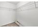 Spacious walk-in closet with wire shelving and plush carpeting at 354 Beachgrass Ln, Summerville, SC 29486