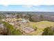 An aerial view of community ammenities including pool, playground, volleyball, and sports field at 404 Norwood Ct, Moncks Corner, SC 29461