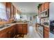 Well-equipped kitchen with stainless steel appliances and granite countertops, offering ample workspace at 404 Norwood Ct, Moncks Corner, SC 29461