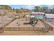 An aerial view of the community playground featuring a slide, climbing structure, and spring riders at 404 Norwood Ct, Moncks Corner, SC 29461