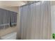 Bathroom featuring a shower with a decorative shower curtain at 404 Topcrest Ln, Moncks Corner, SC 29461