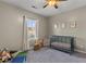 Charming Bedroom with soft lighting, a crib, and play area at 404 Topcrest Ln, Moncks Corner, SC 29461