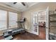 Home gym with view into dining room features hardwood floors, neutral walls, and an open doorway at 404 Topcrest Ln, Moncks Corner, SC 29461