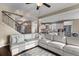 Bright living room showcasing an open layout with access to the staircase and direct view into the kitchen at 404 Topcrest Ln, Moncks Corner, SC 29461