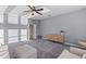 Bright living room with sunlight, comfortable seating, and stylish furnishings at 404 Topcrest Ln, Moncks Corner, SC 29461