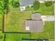 Aerial view of a large backyard with green grass and a wooden fence at 412 Beverly Dr, Summerville, SC 29485