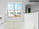 Soaking tub with a view from the window at 412 Beverly Dr, Summerville, SC 29485