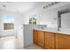 Bright bathroom with a double vanity, large soaking tub, and lots of natural light at 412 Beverly Dr, Summerville, SC 29485