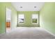 Spacious bedroom with neutral carpet, lots of natural light, and an attached bathroom at 412 Beverly Dr, Summerville, SC 29485