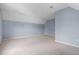Bright bedroom with light blue walls, carpet, and ample lighting at 412 Beverly Dr, Summerville, SC 29485
