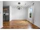Open dining area with hardwood floors, modern lighting, and a view of the kitchen at 412 Beverly Dr, Summerville, SC 29485