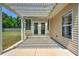 Covered patio area with a pergola, ideal for outdoor dining and entertaining at 412 Beverly Dr, Summerville, SC 29485